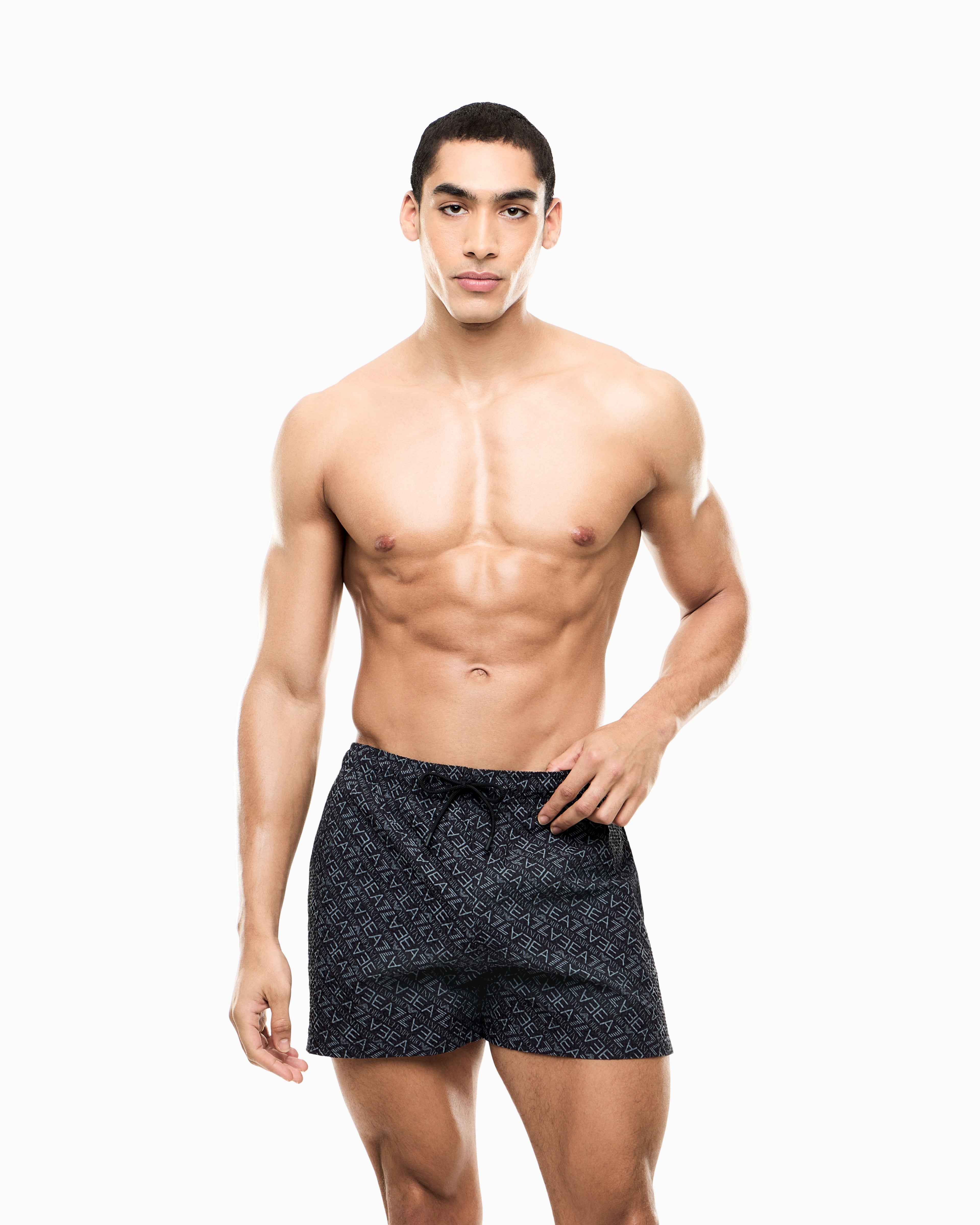 Emporio Armani, Graphic Series Swim Trunks with monogram print